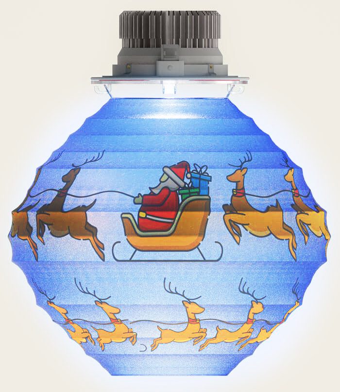 A christmas ornament with santa and reindeer on it.