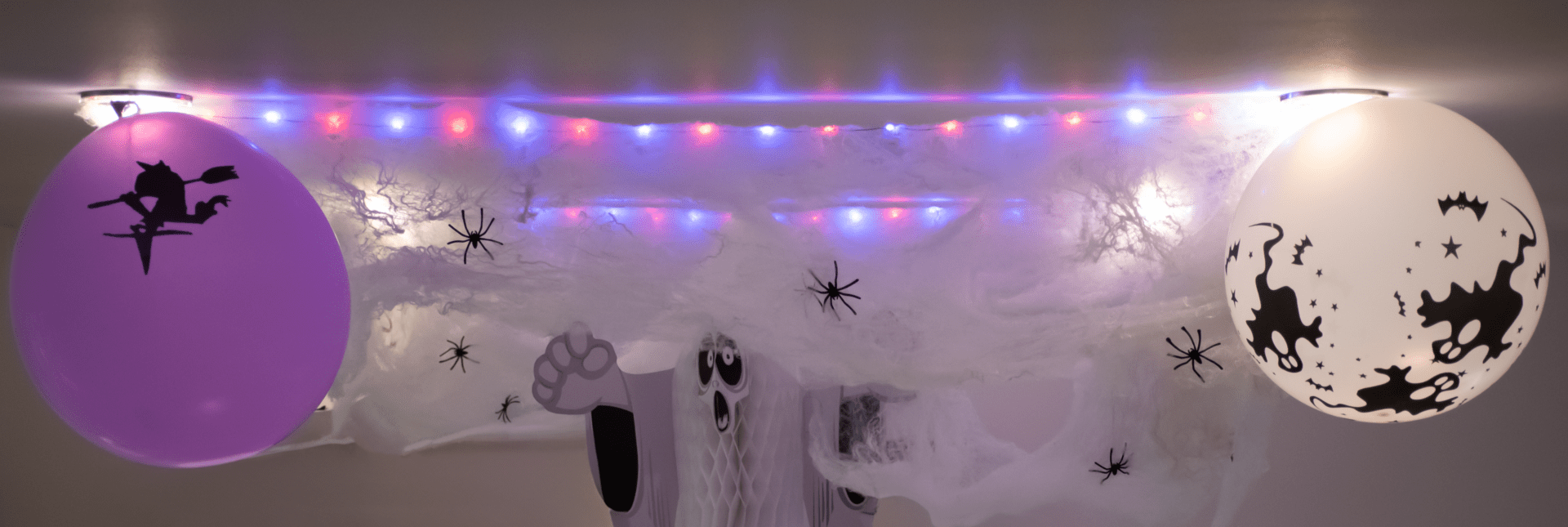 A room with lights and decorations on the wall.